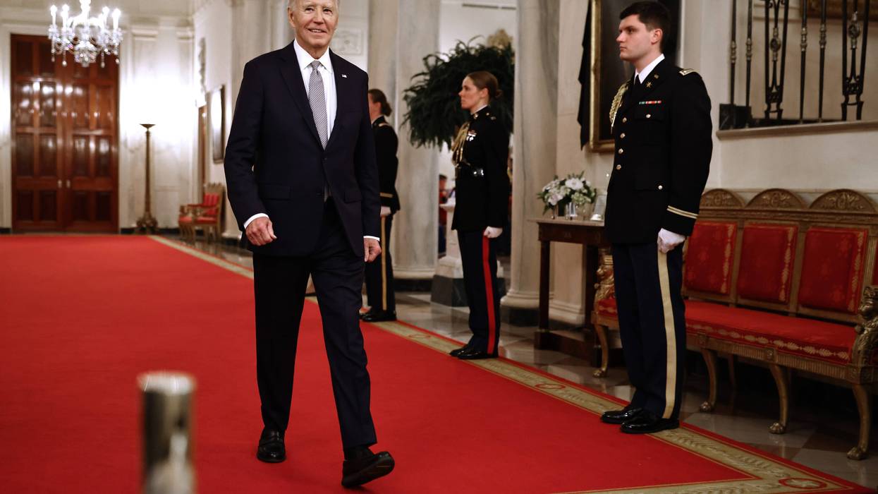 President Joe Biden walks into the East Room to host the Presidential Citizens Medal ceremony at the White House on January 02, 2025 in Washington, DC. B