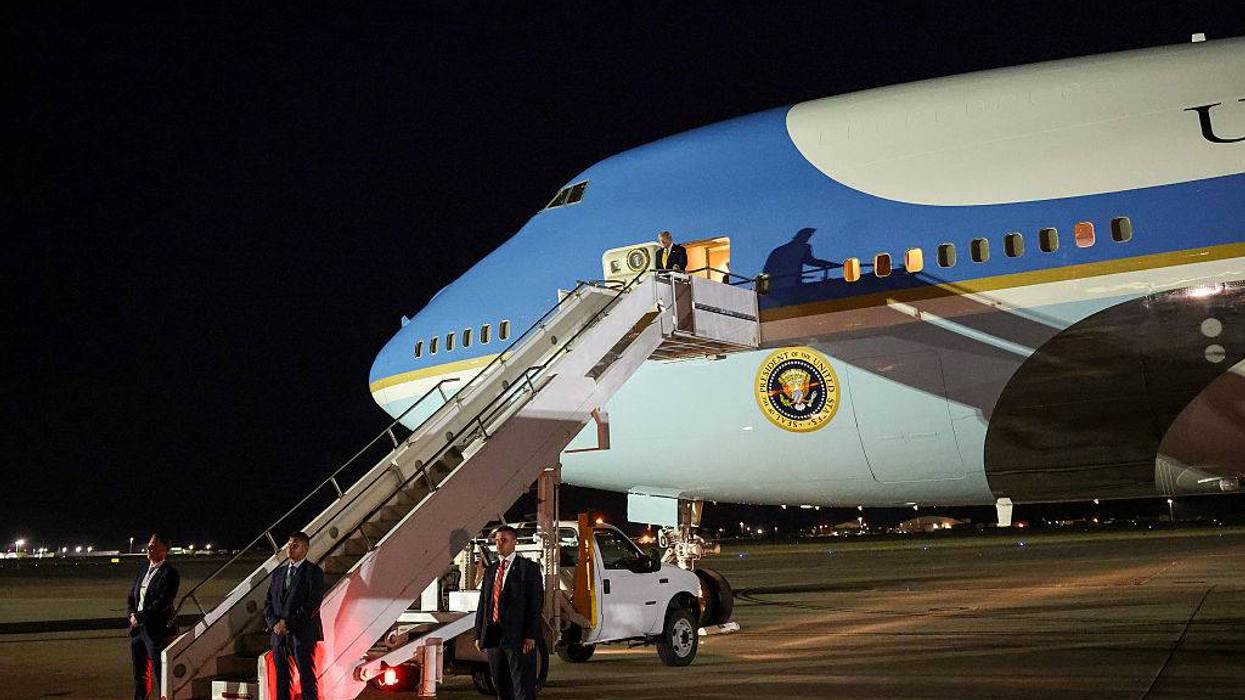 President Trump Aboard Air Force One Stops At Royal Air Force Mildenhall En Route Back From NATO Summit In Turkey