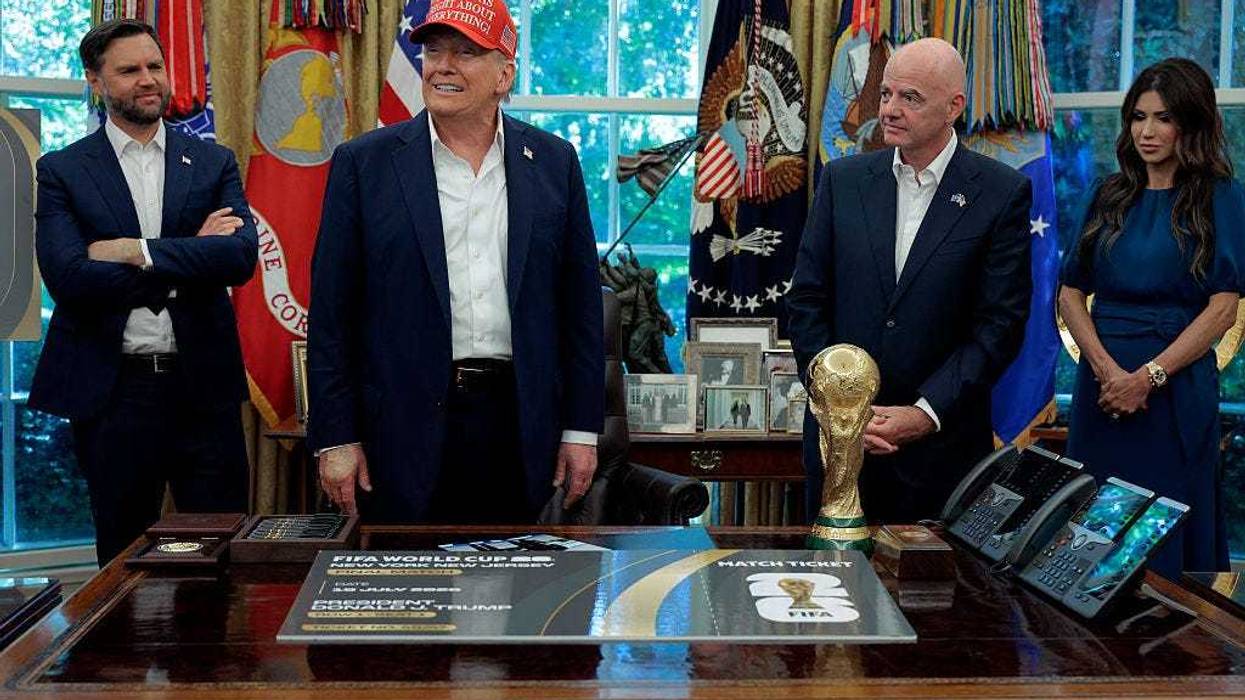 President Trump with Vice President J.D. Vance, FIFA president Gianni Infanito and Homeland Security Secretary Kristi Noem at the White House August 22, 2025.
