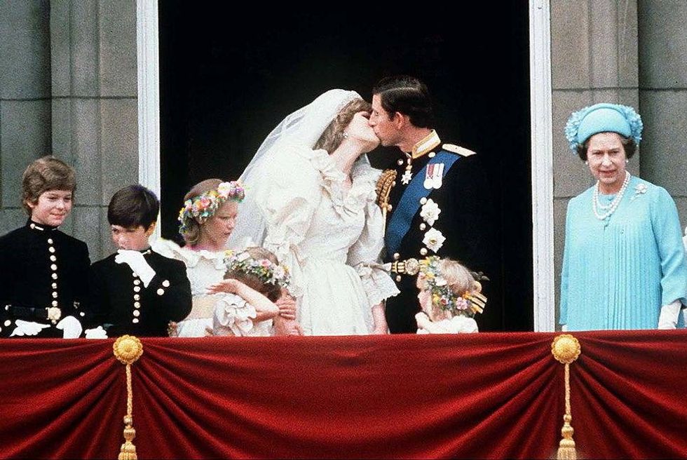 Prince Charles And Princess Diana Kissing On The Balcony Of Buckingham Palace On Their Wedding Day