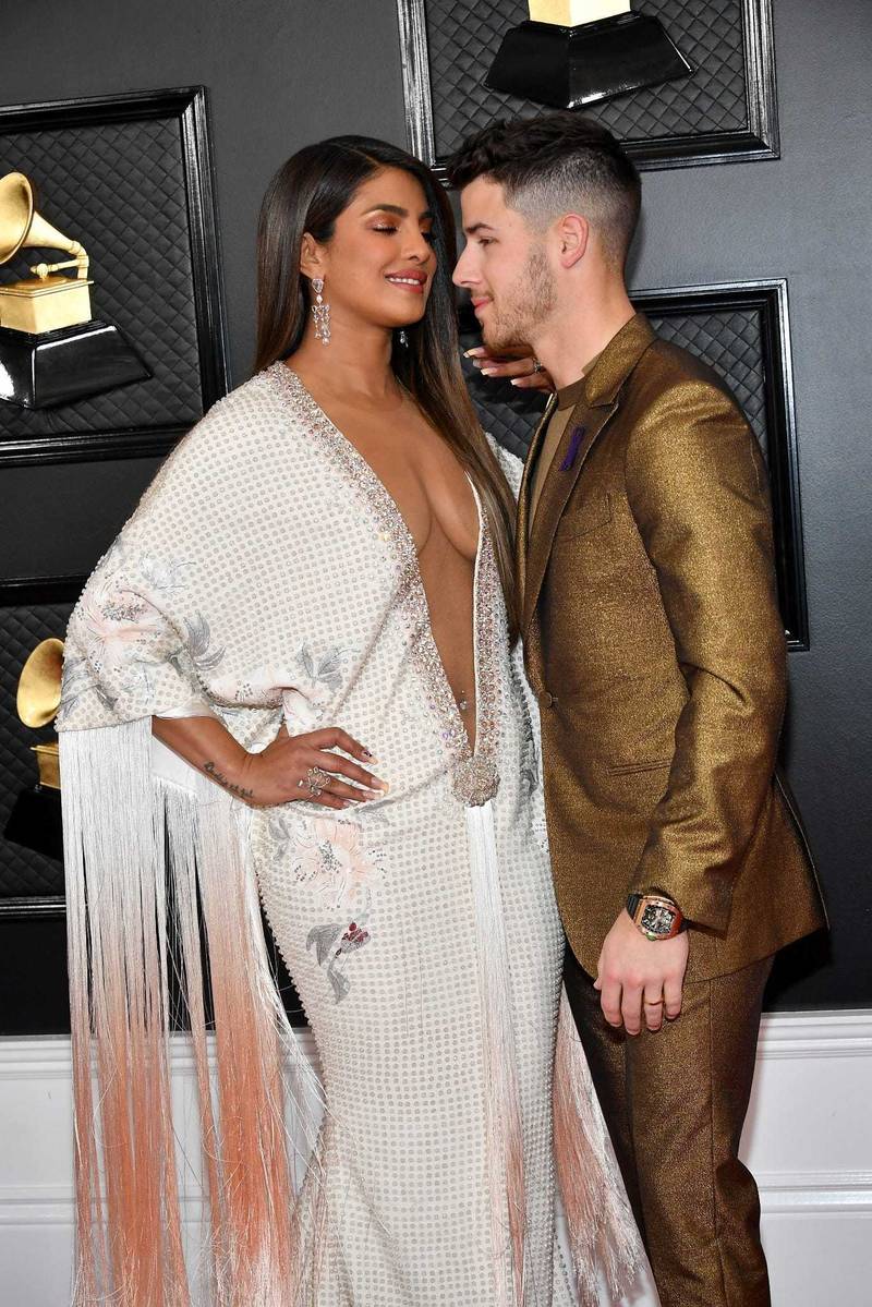 priyanka chopra low cut dress New ravishing pictures of Priyanka Chopra in shimmery orange plunging dress will make you go wow | Photogallery