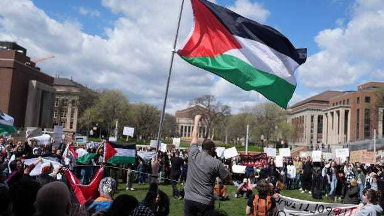 Pro-Palestine supporters chant during a rally against the Israel-Hamas war in Gaza on the University of Minnesota campus.