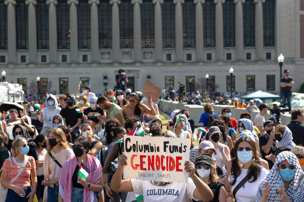 Pro-Palestinian demonstrators hold a short rally after marching around the "Gaza Solidarity Encampment" in the West Lawn of Columbia University on April 29, 2024 in New York City. Demonstrators marched at Columbia University as a 2 P.M. deadline to clear the encampment given to students by the university passed. Columbia was the first elite college to erect an encampment in support of Palestine, with students demanding that the school divest from Israel amid the Israel-Hamas war, in which more than 34,000 Palestinians have been killed in the Gaza Strip.