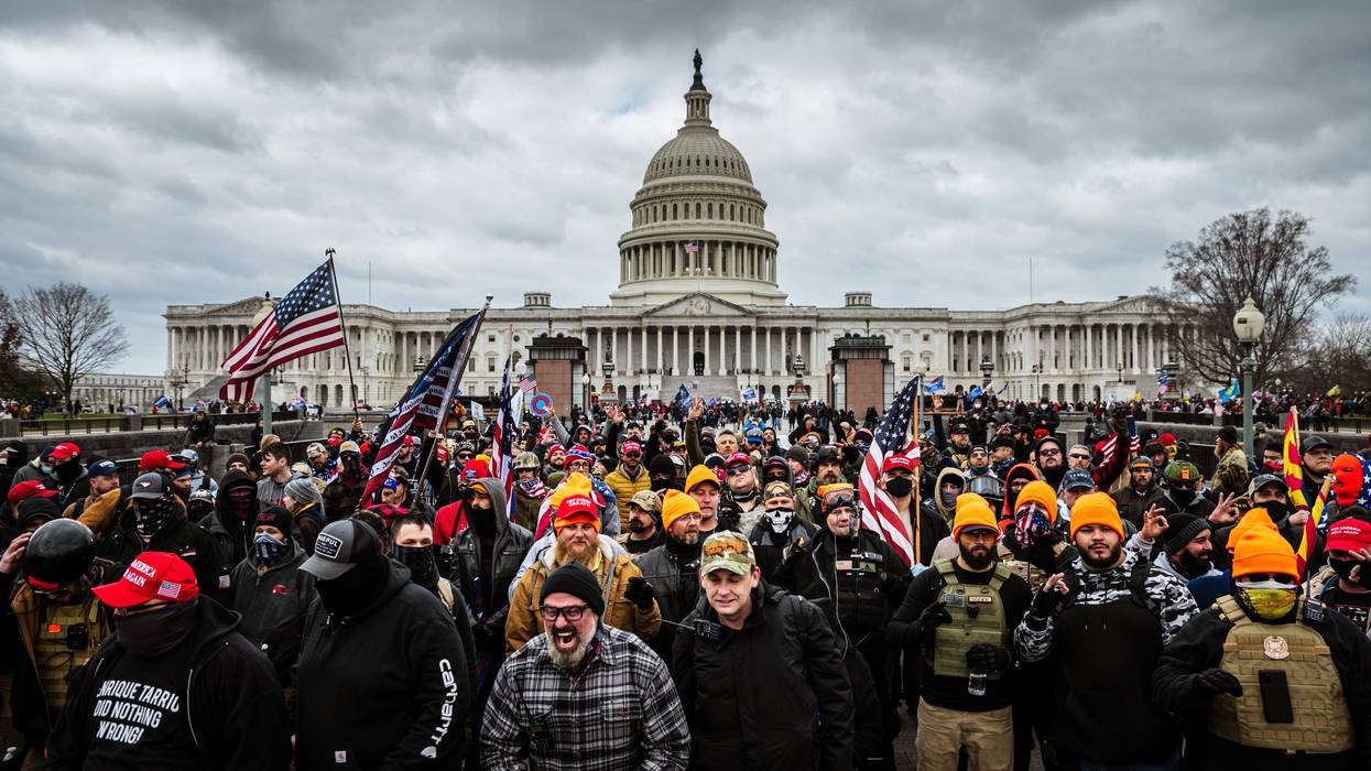 Pro-Trump protesters gather in front of the U.S. Capitol Building on January 6, 2021 in Washington, DC. A pro-Trump mob stormed the Capitol, breaking windows and clashing with police officers. Trump supporters gathered in the nation's capital today to protest the ratification of President-elect Joe Biden's Electoral College victory over President Trump in the 2020 election. (Photo by Jon Cherry/Getty Images)