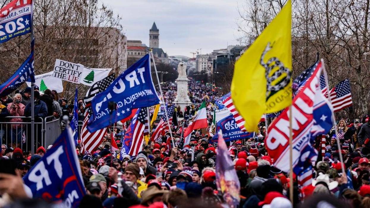 Pro-Trump supporters gather outside the U.S. Capitol following a rally with President Donald Trump on January 6, 2021 in Washington, DC. Trump supporters gathered in the nation's capital today to protest the ratification of President-elect Joe Biden's Electoral College victory over President Trump in the 2020 election.