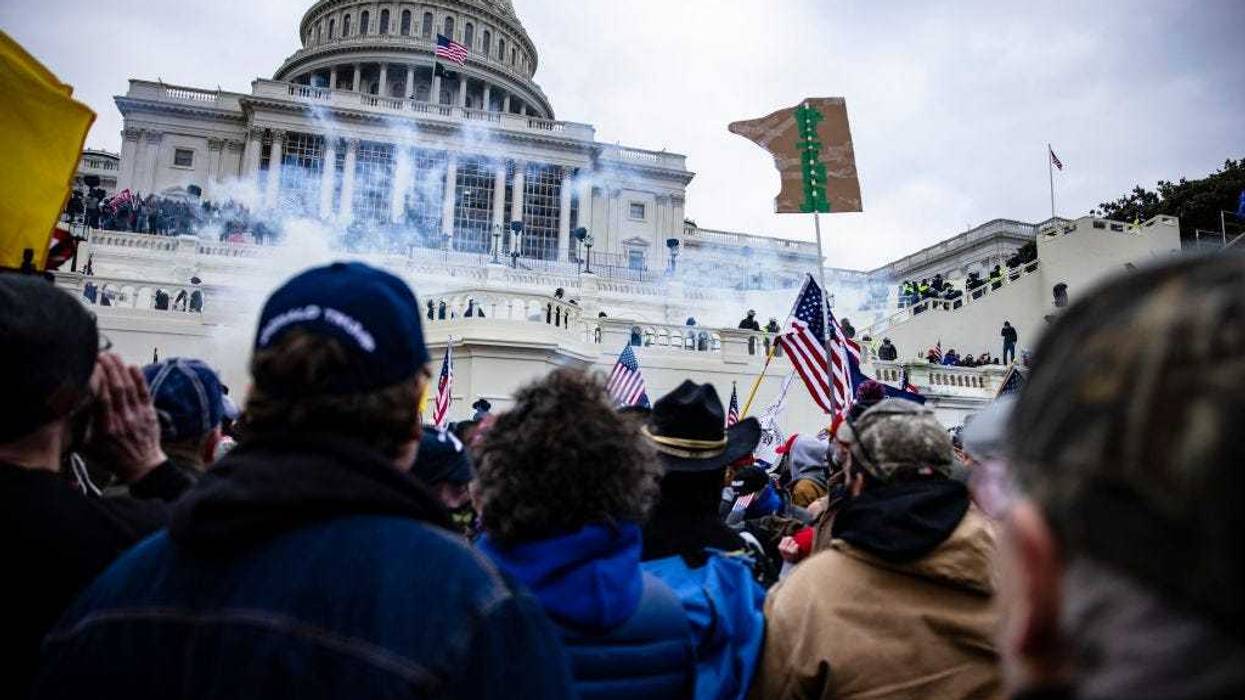 Pro-Trump supporters storm the U.S. Capitol following a rally with President Donald Trump on January 6, 2021 in Washington, DC. Trump supporters gathered in the nation's capital today to protest the ratification of President-elect Joe Biden's Electoral College victory over President Trump in the 2020 election. (Photo by Samuel Corum/Getty Images)