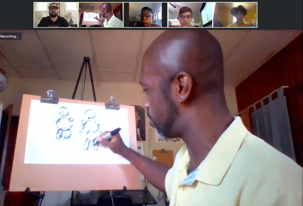 Professional artist Marcel Walker leads an after-school cartooning class