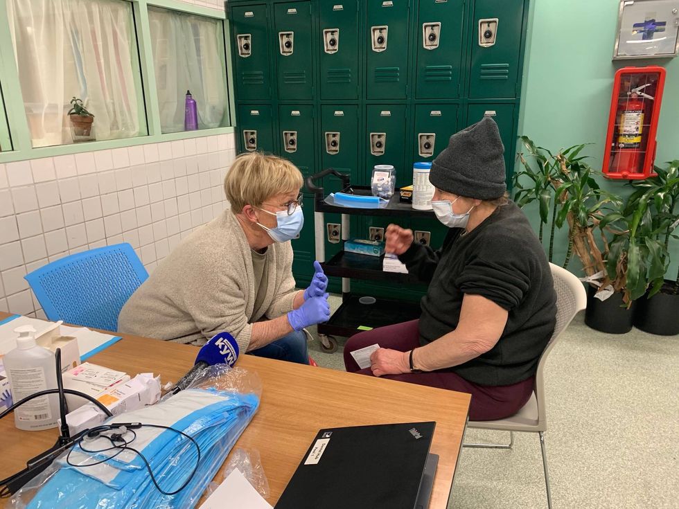 Project HOME gives COVID-19 vaccine to homeless individuals.