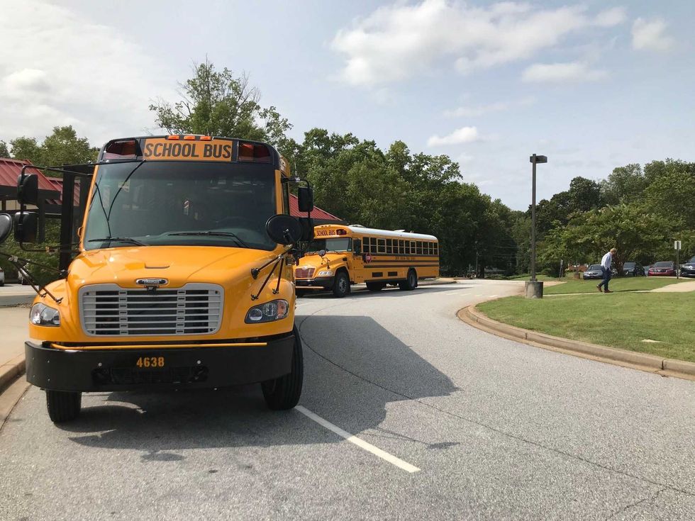 Propane Buses - Emily Gill