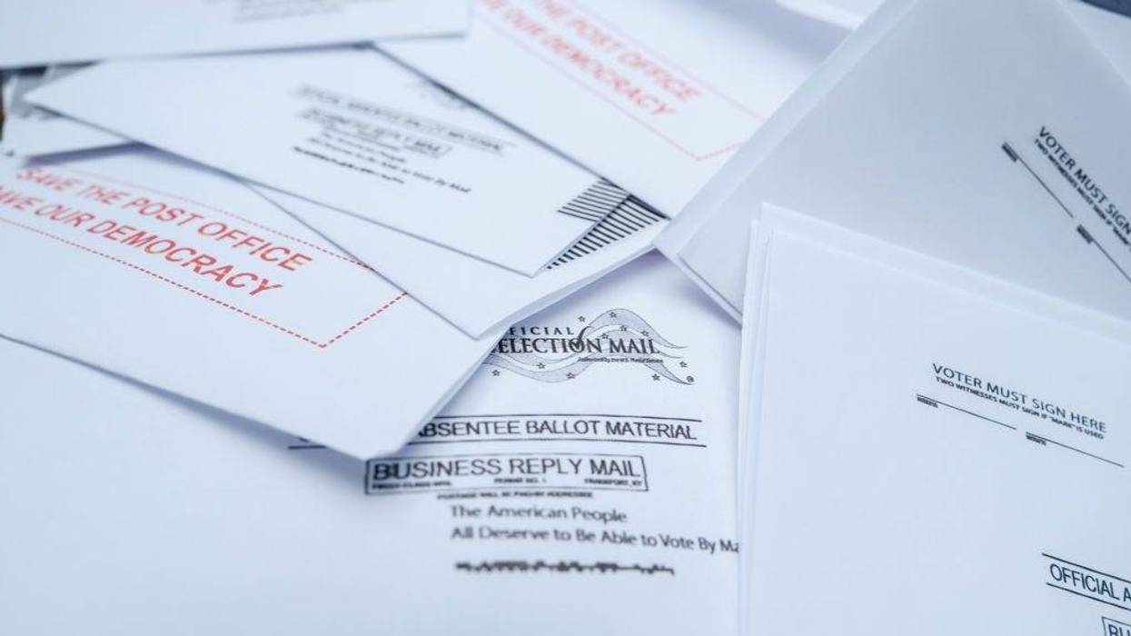Protest material that resemble mail-in election ballots are seen as demonstrators gather on Kalorama Park to protest President Donald Trump donor and current U.S. Postmaster General Louis Dejoy on August 15, 2020 in Washington, DC.