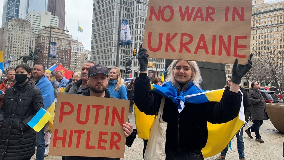 Protesters against the Vladimir Putin-led Russian invasion of Ukraine gathering at Philadelphia City Hall Friday afternoon.