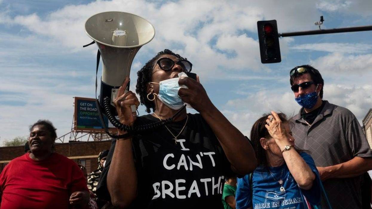 Protesters call for justice for George Floyd following his death on Monday outside the Cup Foods on May 26, 2020 in Minneapolis, Minnesota.