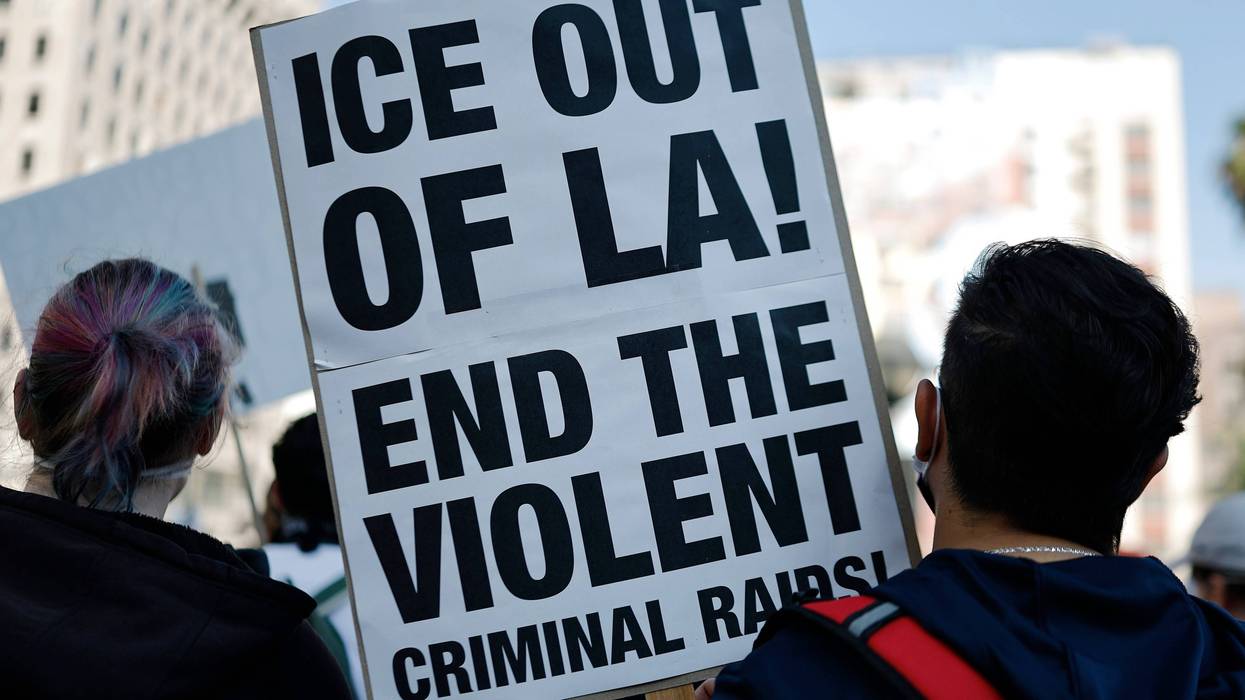 Protesters demonstrate before marching downtown as protests against ICE immigration raids continue in the city on June 11, 2025 in Los Angeles, California.