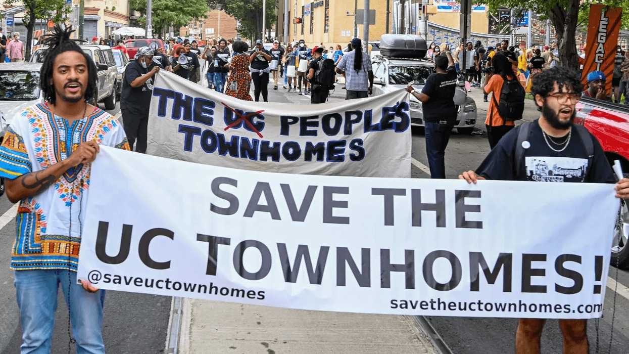 Protesters during a "Save the UC Townhomes" march in July 2022 in University City