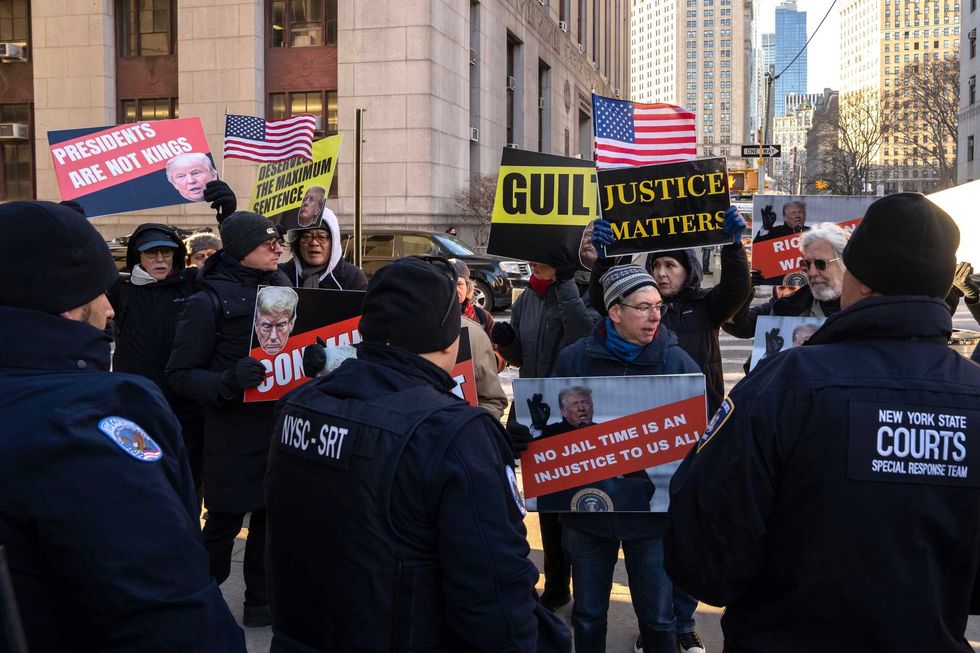 Protesters from "Rise and Resist" rally outside Manhattan Criminal Court to demand jail time for Trump on Jan. 10, 2025