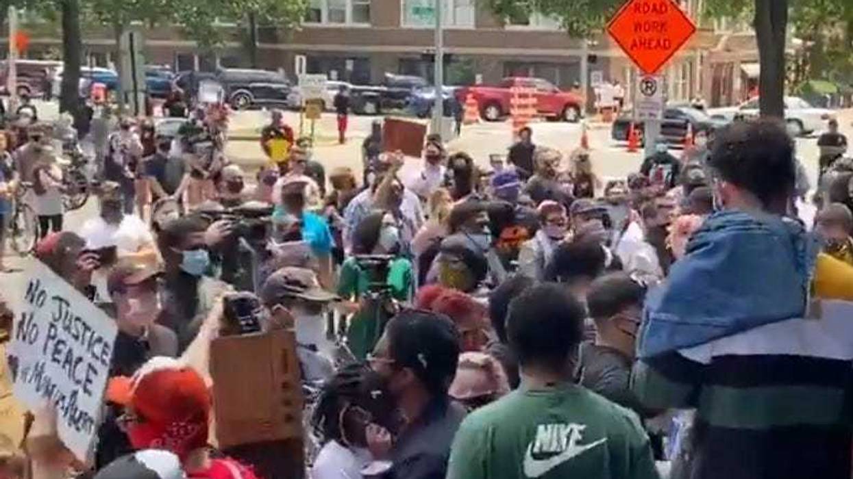 Protesters gather at Richmond City Hall for mayor's apology