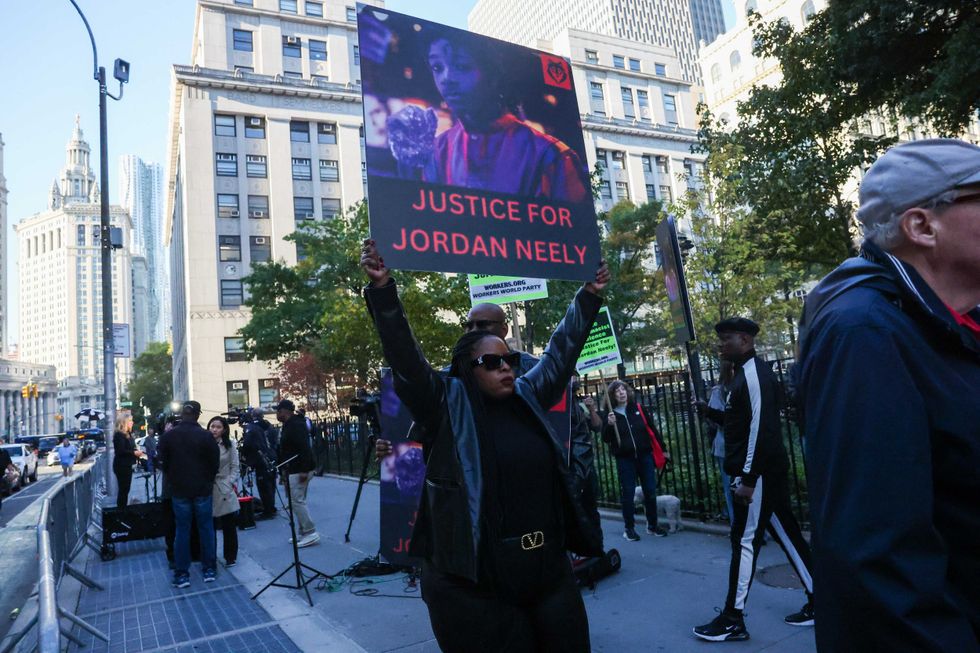 Protesters gather outside of Manhattan Criminal Court on Oct. 21, 2024, as jury selection begins in the trial of Daniel Penny, who is charged in the death of Jordan Neely