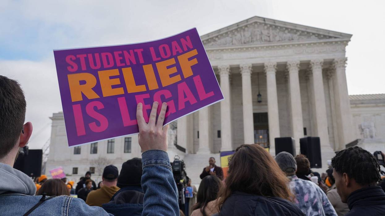 Protesters gather outside the U.S. Supreme Court on Feb. 28, 2023, ahead of the oral arguments in two cases that challenge President Joe Biden's $400 billion student loan forgiveness plan.