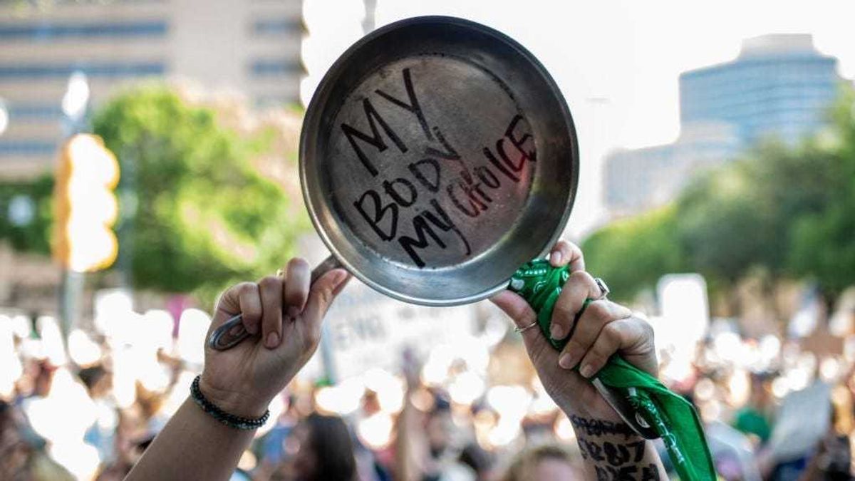 Protesters march during an abortion-rights rally on June 25, 2022 in Austin, Texas.