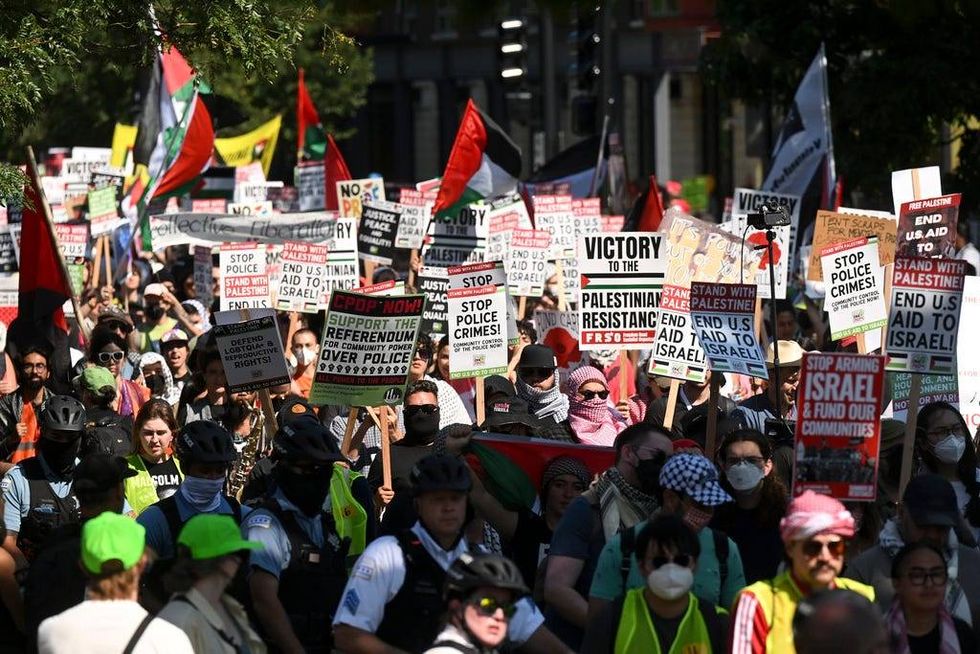 Protesters march to the Democratic National Convention after a rally at Union Park Monday, Aug. 19, 2024, in Chicago.