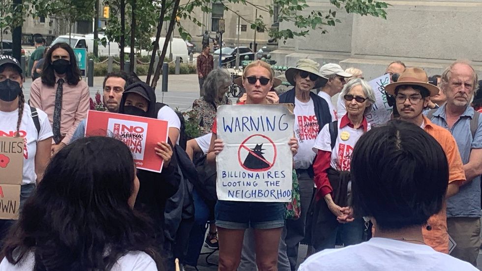 Protesters opposed to the 76ers