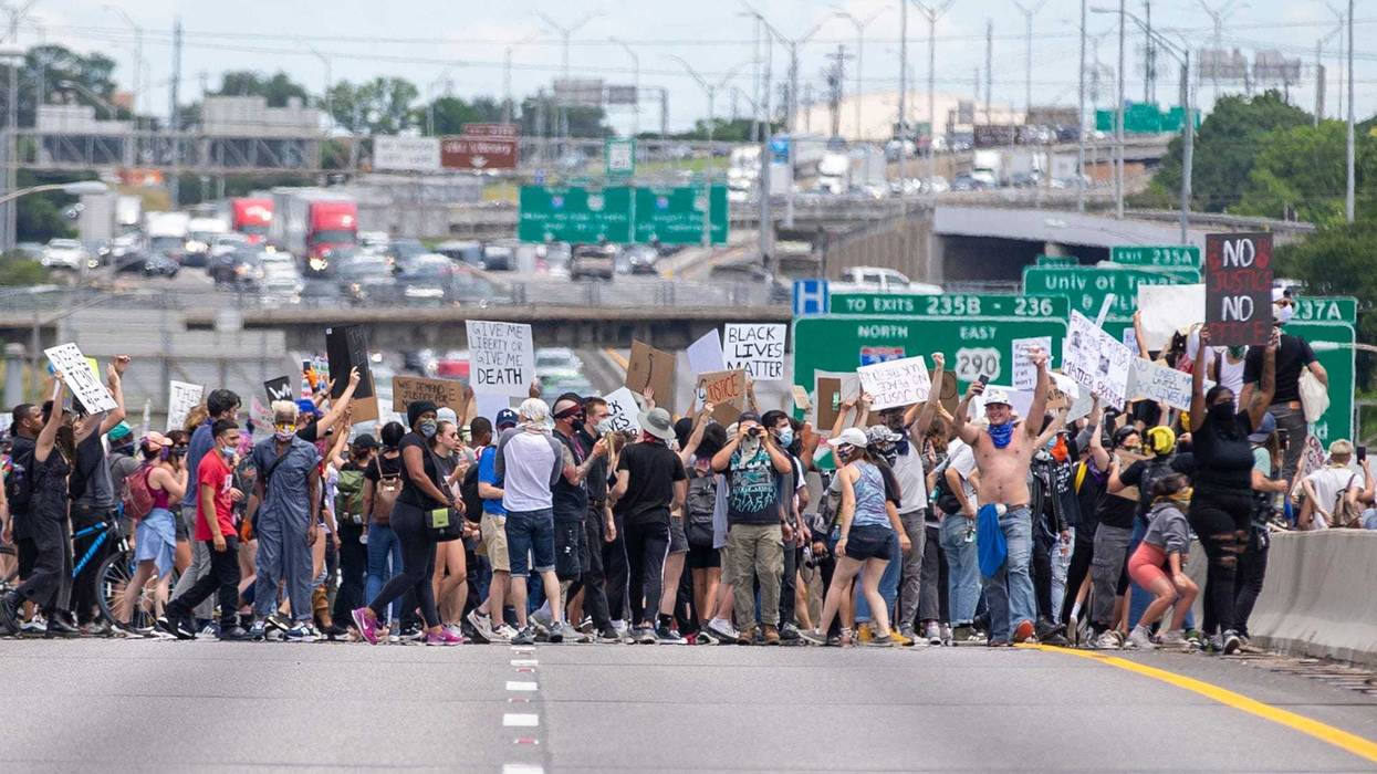 Protesters rush to shut down Interstate 35