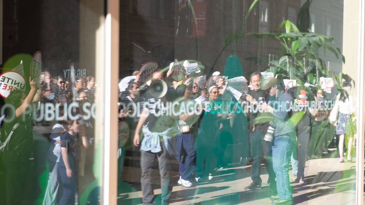 Protesters stand outside Chicago Public School headquarters in this archive photo.