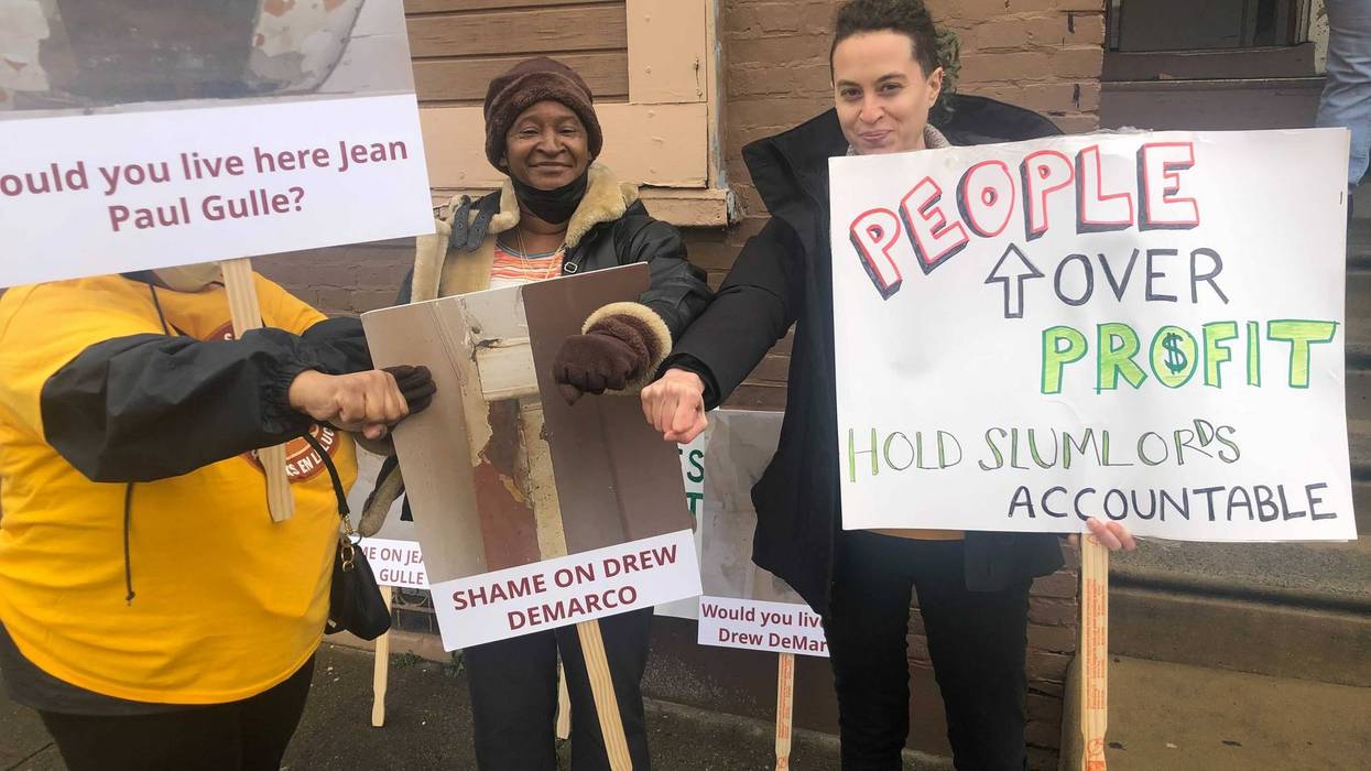 Protesters supporting Sherice Bradham, who says the landlords of her North Philadelphia home have shut her water off in an effort to evict her.