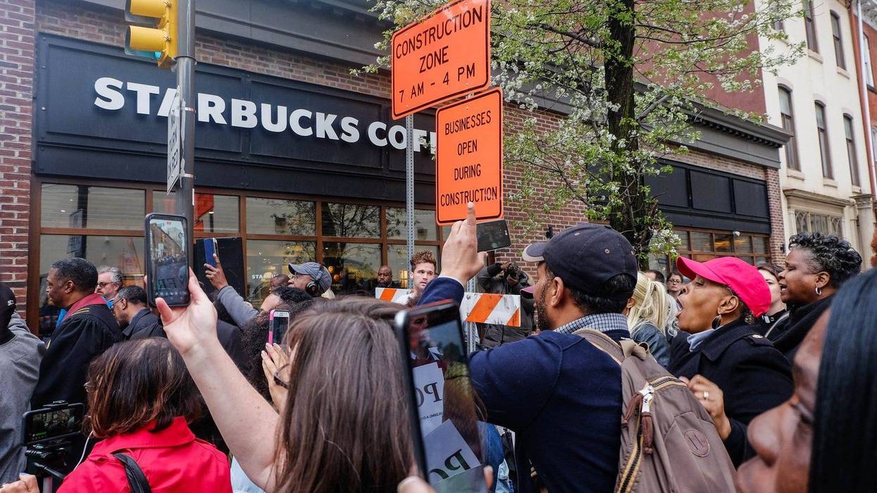 Protesters surround the Rittenhouse Starbucks store on April 16, 2018, where two Black men were wrongfully arrested.