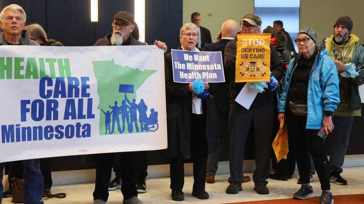Protesters with People's Action target health insurance giant UnitedHealth Group due to exorbitant health insurance costs and insurance claims denials on April 16, 2024 in Eden Prairie, Minnesota.