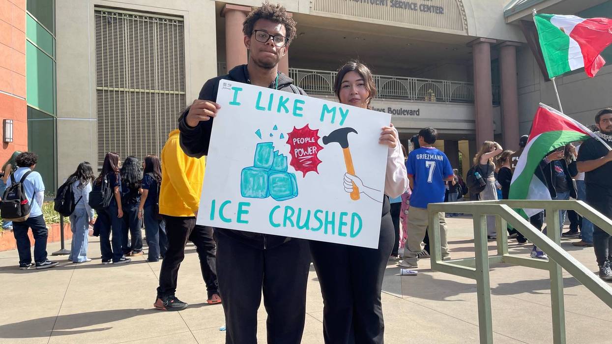 protesters with sign that says i like my ice crushed