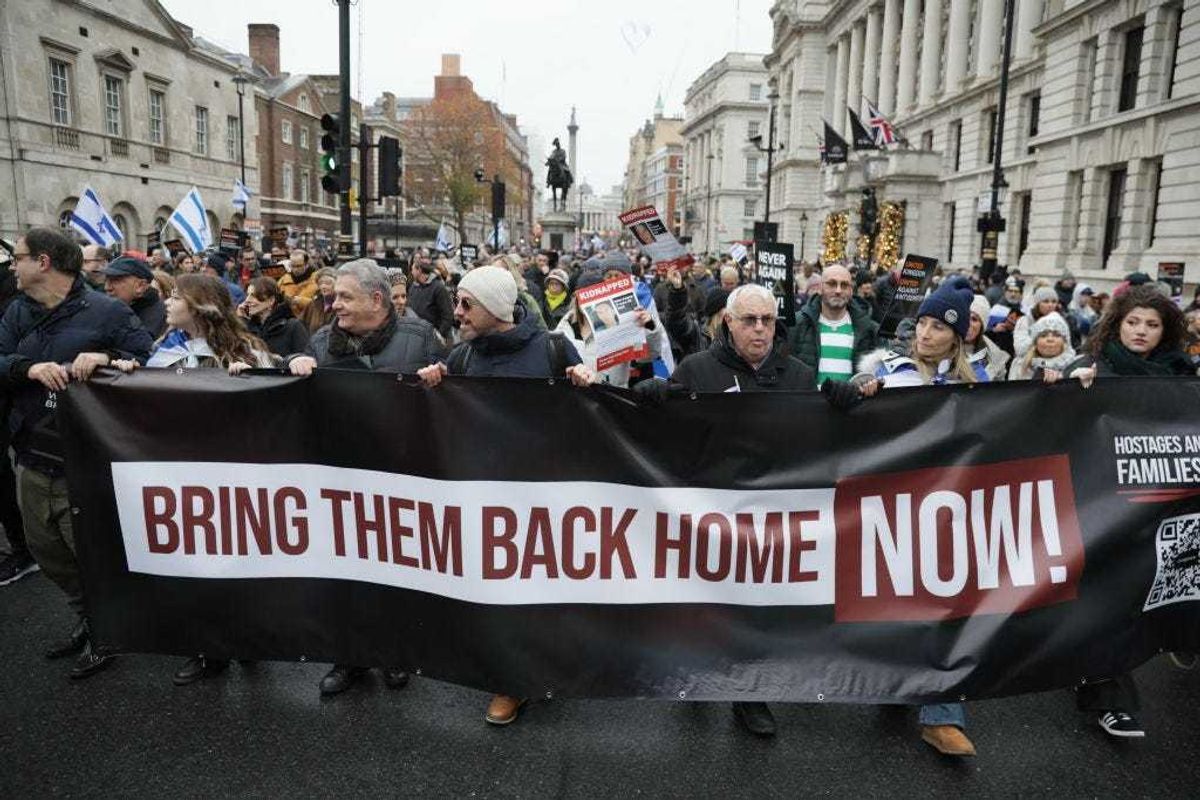 Protestors march against anti-Semitism on November 26, 2023 in London, England.