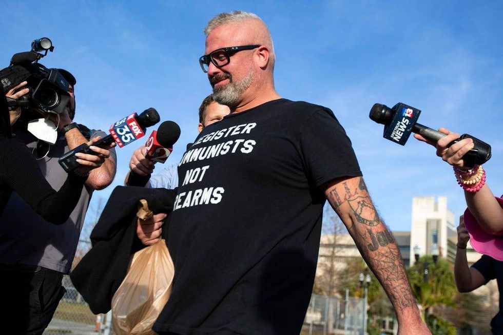 Proud Boys organizer Joseph Biggs walks from the George C. Young Federal Annex Courthouse in Orlando, Fla., Jan. 20, 2021, after a court hearing regarding his involvement in riot at the U.S. Capitol on Jan. 6, 2021.