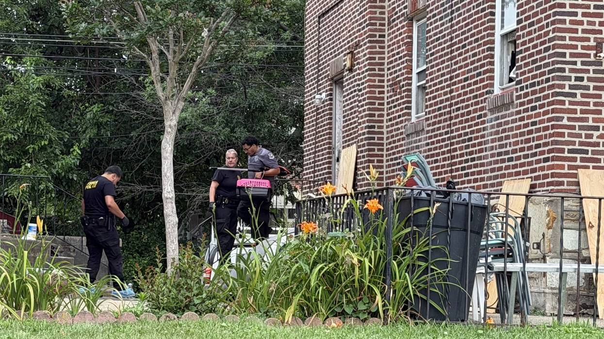 PSPCA law enforcement officers remove animals from an Oxford Circle home on Tuesday, July 7, after two children were found inside the home and taken to a hospital.