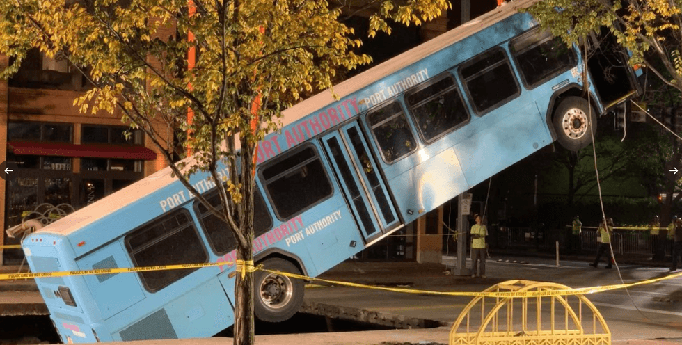 Pulling bus out of sinkhole