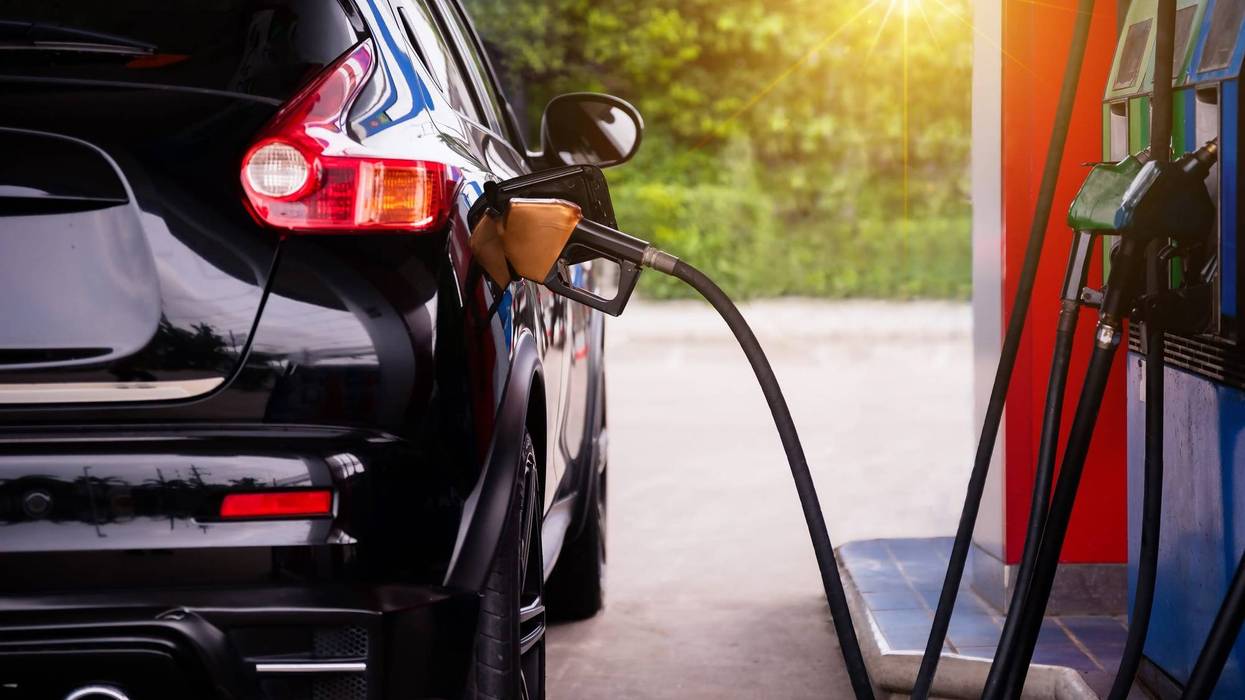 Pumping gasoline fuel in car