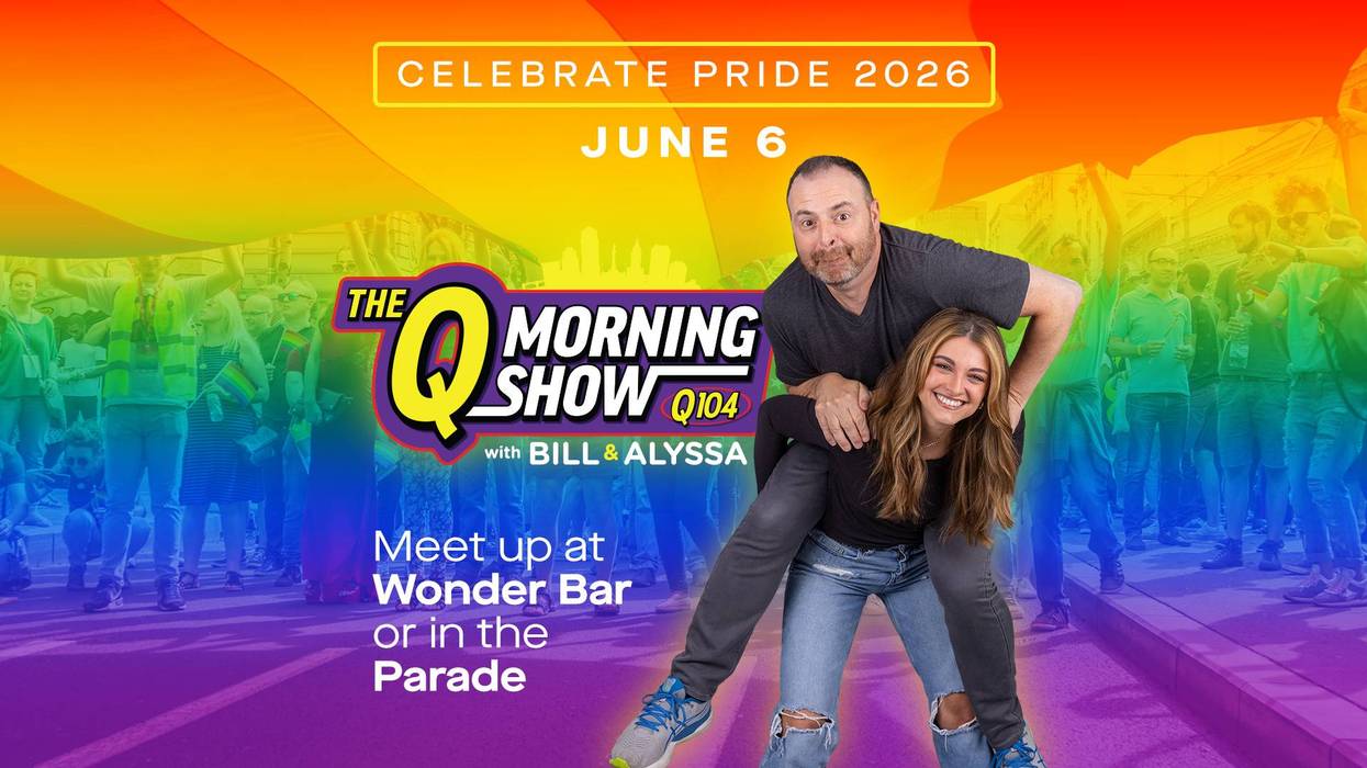 Q Morning Show's Bill & Alyssa at a rainbow Pride 2026 event June 6, Bill piggybacking Alyssa.