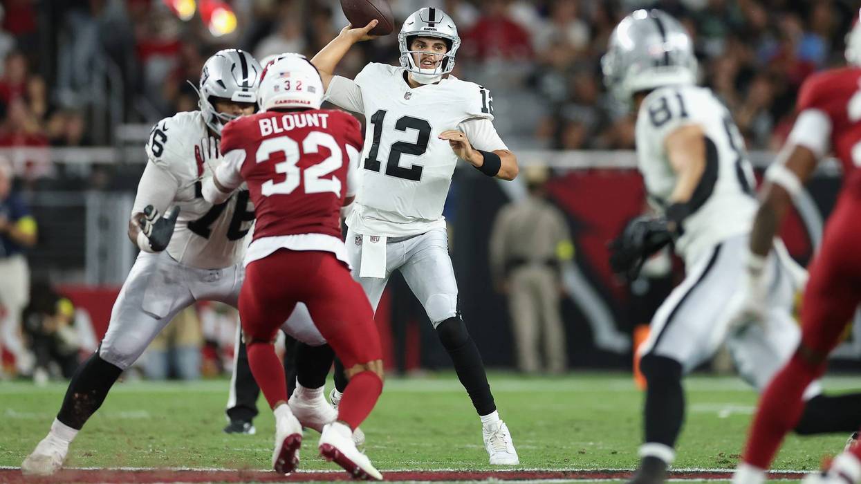Quarterback Aidan O'Connell #12 of the Las Vegas Raiders throws a pass during first half of the NFL preseason 2025 game against the Arizona Cardinals at State Farm Stadium on August 23, 2025 in Glendale, Arizona.