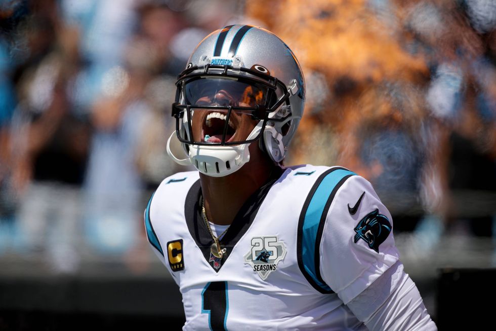 Quarterback Cam Newton takes the field for Carolina