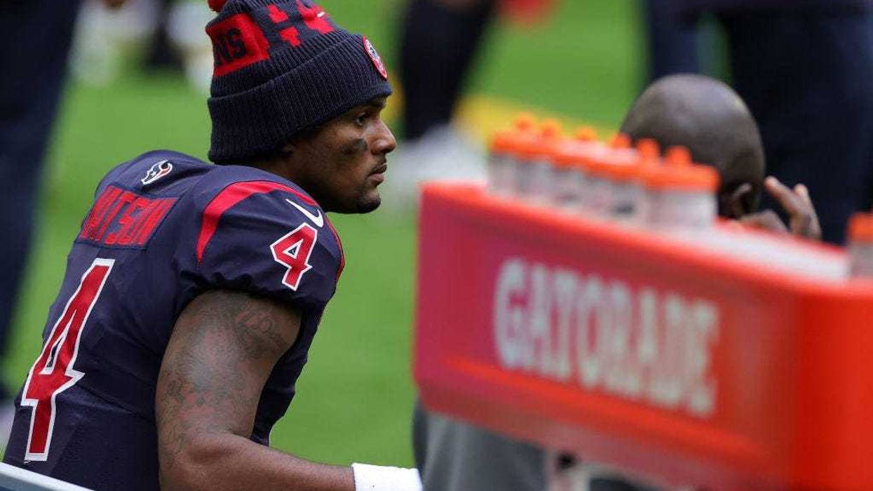 Quarterback Deshaun Watson #4 of the Houston Texans looks on from the bench late in the fourth quarter of the game against the Cincinnati Bengals at NRG Stadium on December 27, 2020 in Houston, Texas.