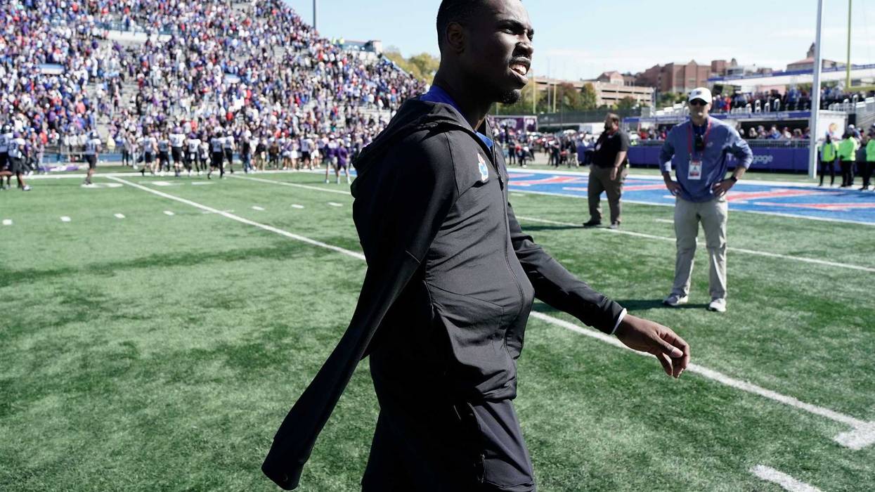Quarterback Jalon Daniels #6 of the Kansas Jayhawks walks off the field after a 38-31 loss to TCU Horned Frogs in the second half at David Booth Kansas Memorial Stadium on October 08, 2022 in Lawrence, Kansas.