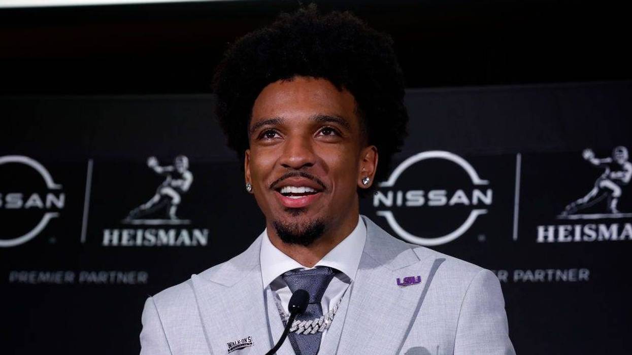 Quarterback Jayden Daniels of the LSU Tigers speaks to the media after being awarded The Heisman Memorial Trophy at New York Marriott Marquis Hotel on December 09, 2023 in New York City. (Photo by Sarah Stier/Getty Images)