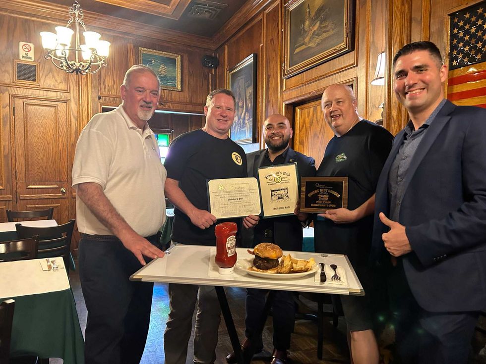Queens Chamber of Commerce President Thomas J. Grech (left) and Assemblymember Steven Raga (center) were on hand for the award presentation at Donovan