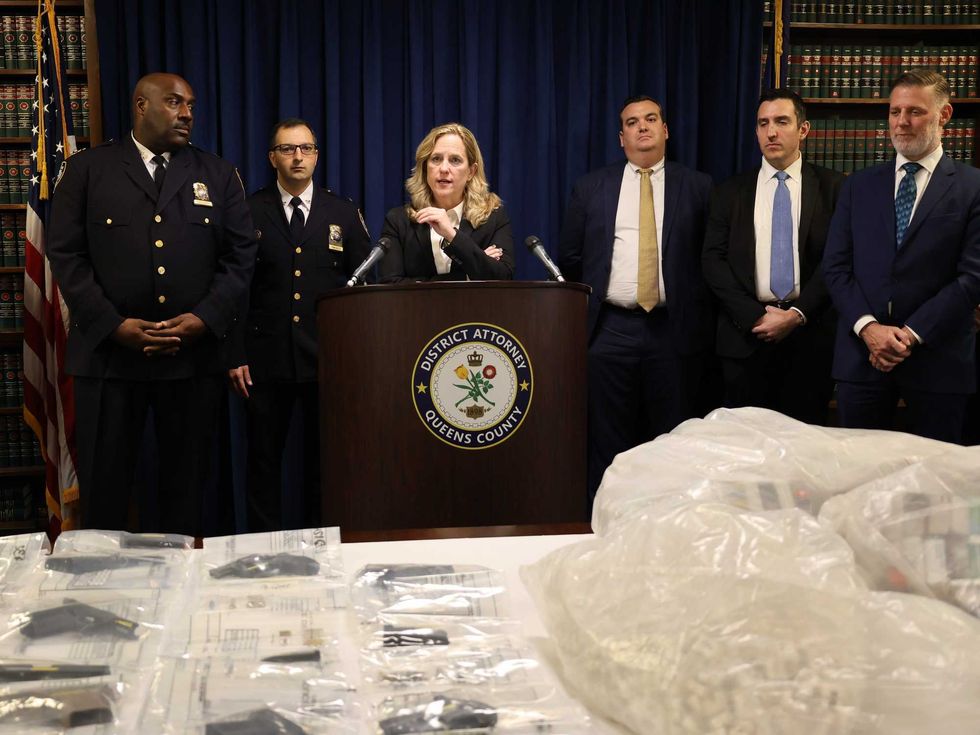 Queens District Attorney Melinda Katz announced that Victor Rodriguez was indicted on drug and gun charges after a search of an abandoned home in Bellerose uncovered millions of dollars worth of heroin, fentanyl and cocaine and a stockpile of firearms on Nov. 1, 2023.