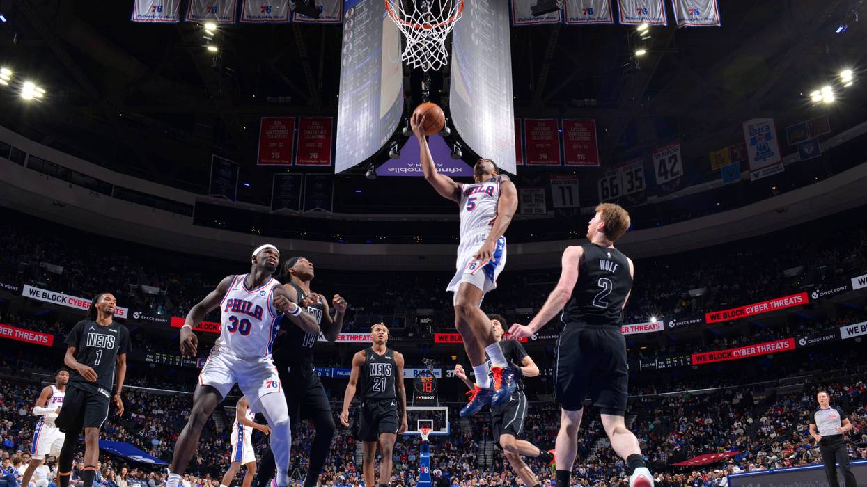 Quentin Grimes #5 of the Philadelphia 76ers drives to the basket during the game against the Brooklyn Nets on March 14, 2026 at the Wells Fargo Center