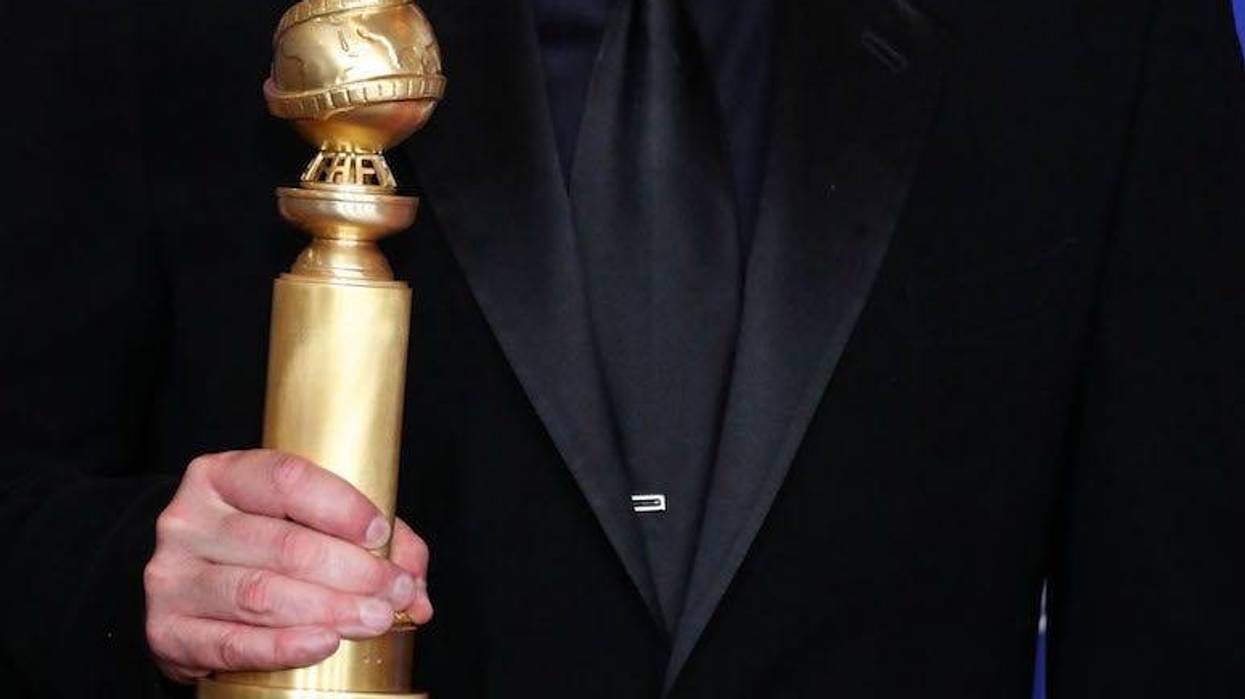 Quentin Tarantino poses with Golden Globe Award, 2020