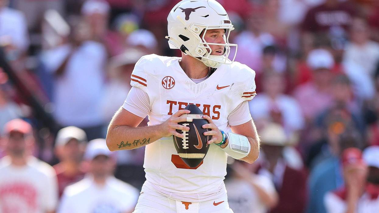 Quinn Ewers #3 of the Texas Longhorns looks to throw the ball during the second quarter against the Oklahoma Sooners at Cotton Bowl Stadium on Oct. 12, 2024, in Dallas, Texas.