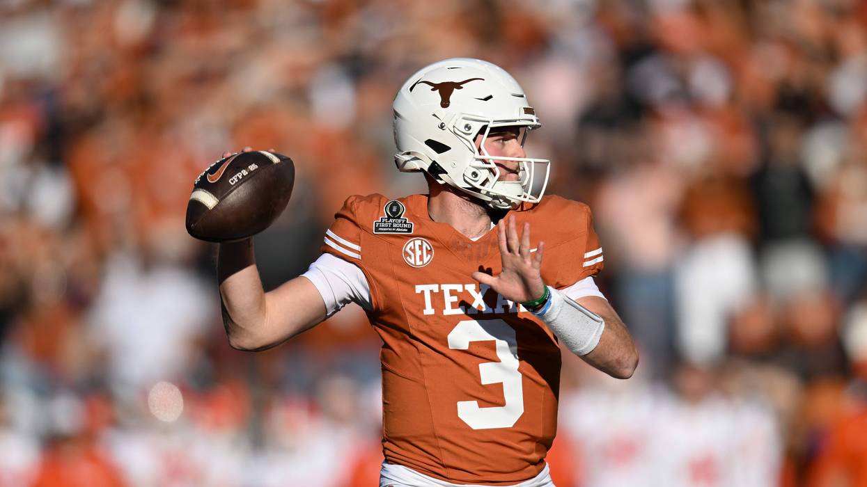 Quinn Ewers #3 of the Texas Longhorns throws the ball during the first quarter against the Clemson Tigers in the Playoff First Round Game at Darrell K Royal-Texas Memorial Stadium on December 21, 2024 in Austin, Texas.