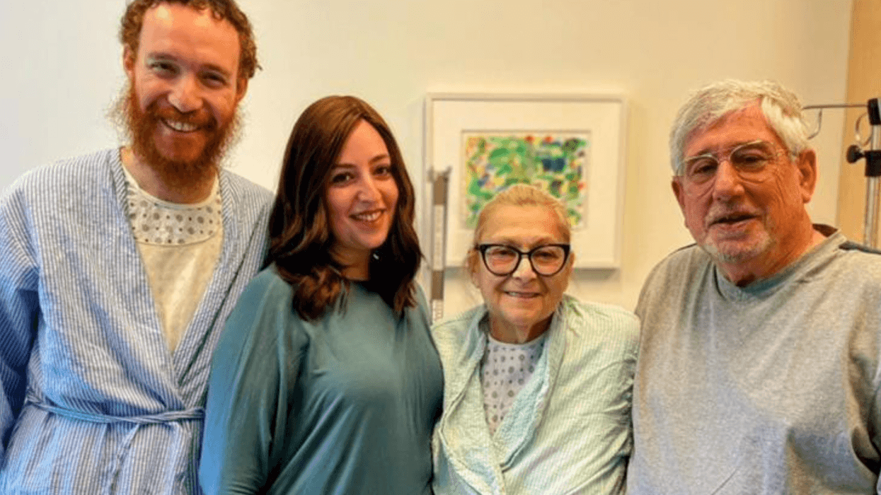 Rabbi Aizik Baumgarten, his wife, Musia, Terri Davgin, and her husband, Richard