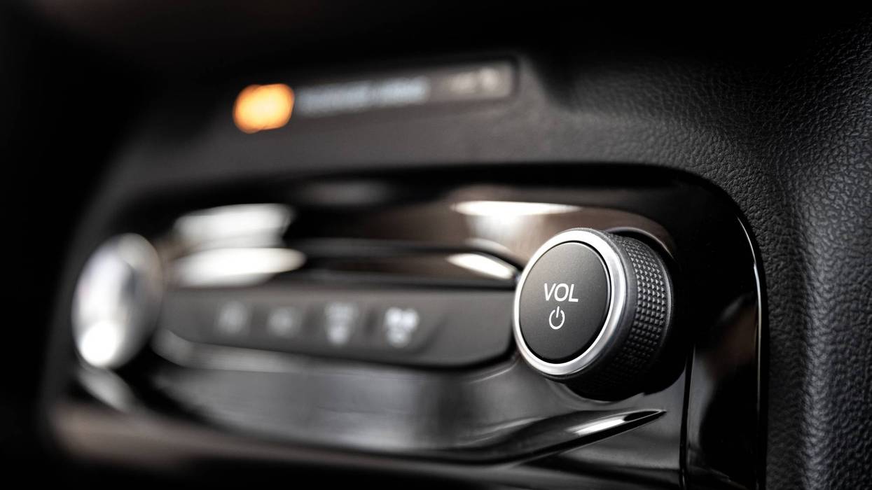 radio on off power button and interior dashboard for radio sound music entertainment in vehicle modern and luxury car automobile